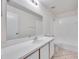 Clean bathroom featuring a combination shower and tub with a white vanity at 1302 Twilridge Pl, Brandon, FL 33511