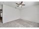 Empty bedroom with a ceiling fan and neutral carpet at 1302 Twilridge Pl, Brandon, FL 33511