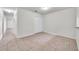 Neutral bedroom features tile flooring and a double-door closet for ample storage at 1302 Twilridge Pl, Brandon, FL 33511