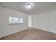 Cozy dining area featuring tile floors, neutral walls, and a serving hatch to the adjacent kitchen at 1302 Twilridge Pl, Brandon, FL 33511