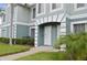 Charming townhome exterior with well-manicured landscaping and a welcoming entrance at 1302 Twilridge Pl, Brandon, FL 33511