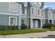 Inviting condo featuring a charming exterior with well-maintained landscaping, set under a clear blue sky at 1302 Twilridge Pl, Brandon, FL 33511