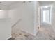 Bright hallway with carpet flooring leading to multiple rooms with neutral paint at 1302 Twilridge Pl, Brandon, FL 33511