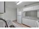 Kitchen featuring white cabinets, granite counters, and stainless steel appliances at 1302 Twilridge Pl, Brandon, FL 33511