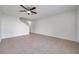 Inviting living room featuring neutral walls, tile flooring, and a staircase, perfect for relaxation and entertainment at 1302 Twilridge Pl, Brandon, FL 33511