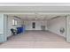 Spacious garage featuring an open layout, a window, and storage at 1306 Idlewood Dr # 53, Sun City Center, FL 33573