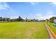 Community lawn bowling area featuring a lush green lawn and comfortable seating at 1306 Idlewood Dr # 53, Sun City Center, FL 33573