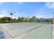 Community shuffleboard courts with shaded seating areas, offering recreational opportunities at 1306 Idlewood Dr # 53, Sun City Center, FL 33573