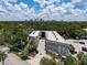 Aerial view showcasing the building's architecture and location with downtown views and ample parking at 1508 S Howard Ave # A, Tampa, FL 33606