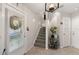 Inviting entryway with neutral tones, tiled floor and a staircase at 1508 S Howard Ave # A, Tampa, FL 33606