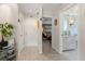 Bright hallway showcasing access to the bedroom and bathroom with decorative accents at 1508 S Howard Ave # A, Tampa, FL 33606