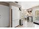 Cozy kitchen featuring white appliances, tile floors, and convenient outside access at 1508 S Howard Ave # A, Tampa, FL 33606