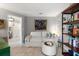 Bright living room featuring neutral walls, tile floors, and a comfortable white couch at 1508 S Howard Ave # A, Tampa, FL 33606
