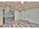 Versatile bonus room with wood-style flooring and a bright, airy atmosphere at 1530 Erin Ln, Clearwater, FL 33755