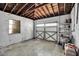 Spacious garage featuring a large double door and ample storage space at 1530 Erin Ln, Clearwater, FL 33755