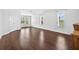 Large bedroom with hardwood floors, closet, and windows at 19028 Narimore Dr, Land O Lakes, FL 34638