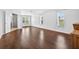 Large bedroom with hardwood floors, ensuite, closet, and windows at 19028 Narimore Dr, Land O Lakes, FL 34638
