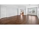 Spacious main bedroom features wood floors, ensuite bath, and access to the walk-in closet at 19028 Narimore Dr, Land O Lakes, FL 34638