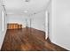 Spacious main bedroom with wood floors and ample space for furniture at 19028 Narimore Dr, Land O Lakes, FL 34638