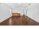 Well-lit main bedroom featuring wood floors and ample space for furniture at 19028 Narimore Dr, Land O Lakes, FL 34638