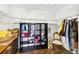 Walk-in closet featuring shelving and storage space at 19028 Narimore Dr, Land O Lakes, FL 34638