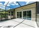 Enclosed patio with outdoor access, showcasing potential for entertainment and relaxation at 21248 Diamonte Dr, Land O Lakes, FL 34637