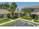Well maintained exterior with lush, tropical landscaping and assigned parking spots at 2131 Ridge S Rd # 19, Largo, FL 33778