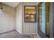 The view outside the front door looks through a window into the kitchen and refrigerator at 2131 Ridge S Rd # 19, Largo, FL 33778