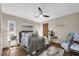 Comfortable bedroom with a plush bed, stylish decor, and a relaxing ambiance with ceiling fan at 2174 Kent Ave, Clearwater, FL 33764