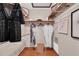 Walk-in closet with organized shelving, hanging rods, and ample space for storage at 2174 Kent Ave, Clearwater, FL 33764