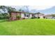 A well-kept home with a large front lawn and tasteful landscaping, offering great curb appeal at 2174 Kent Ave, Clearwater, FL 33764