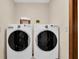 Convenient laundry room with front loading washer and dryer at 2174 Kent Ave, Clearwater, FL 33764