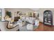 Cozy living room featuring stylish furnishings, hardwood floors, and modern lighting at 2174 Kent Ave, Clearwater, FL 33764