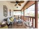 Inviting covered patio features comfortable seating and stylish decor at 2174 Kent Ave, Clearwater, FL 33764