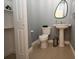 Cozy bathroom featuring pedestal sink at 21921 Us Highway 98, Dade City, FL 33523
