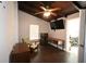 This bedroom features hardwood floors, a ceiling fan and an ensuite bath at 21921 Us Highway 98, Dade City, FL 33523