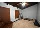 This bedroom offers hardwood floors, a comfortable chair and built-in blinds at 21921 Us Highway 98, Dade City, FL 33523