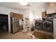 Spacious laundry room features modern washer/dryer, storage, and a convenient utility sink at 21921 Us Highway 98, Dade City, FL 33523