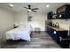 Functional bedroom equipped with a kitchenette, providing comfort and convenience at 2509 Thornbrook Pl, Tampa, FL 33618