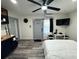 Well-equipped bedroom area includes a small dining table and a modern entertainment setup at 2509 Thornbrook Pl, Tampa, FL 33618