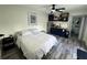 Comfortable bedroom featuring a cozy sleeping area and a compact kitchenette at 2509 Thornbrook Pl, Tampa, FL 33618