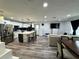 Spacious open-concept living area seamlessly integrating the kitchen, dining, and living spaces at 2509 Thornbrook Pl, Tampa, FL 33618