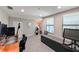 Bonus room features neutral walls, a custom bench, and a sleek tiled floor at 2568 13Th N Ave # 2568, St Petersburg, FL 33713