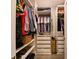 Walk-in closet featuring built-in shelves, drawers, and ample space for storage at 2568 13Th N Ave # 2568, St Petersburg, FL 33713