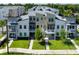 Modern townhome with balconies, manicured lawn, and fresh landscaping in a desirable community at 2568 13Th N Ave # 2568, St Petersburg, FL 33713