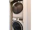 Modern, stacked, front-load washer and dryer in the laundry room for added convenience at 2568 13Th N Ave # 2568, St Petersburg, FL 33713