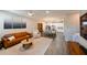 Open concept living and dining areas with hardwood flooring and modern decor at 2568 13Th N Ave # 2568, St Petersburg, FL 33713