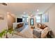 Spacious living room with stylish furniture, hardwood floors, and great natural lighting at 2568 13Th N Ave # 2568, St Petersburg, FL 33713