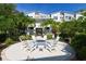 Outdoor area with a fire pit and comfortable seating, perfect for entertaining guests at 2568 13Th N Ave # 2568, St Petersburg, FL 33713