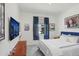Cozy bedroom featuring comfortable furnishings and decor, with natural light from the window at 31426 Ancient Sage Rd, Wesley Chapel, FL 33545